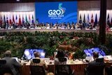 líderes discutindo em reunião oficial do G20